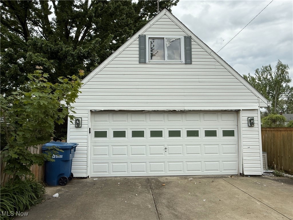 garage featuring fence