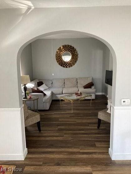 566 N Walnut St, Wooster, OH 44691 - living area featuring wood finished floors and arched walkways