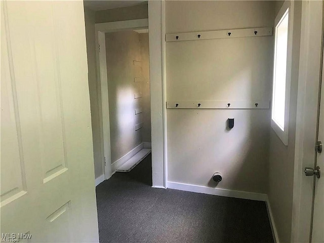 566 N Walnut St, Wooster, OH 44691 - laundry area with baseboards and dark colored carpet