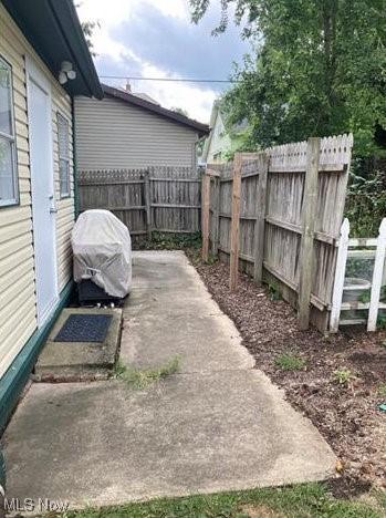 566 N Walnut St, Wooster, OH 44691 - view of patio with a fenced backyard