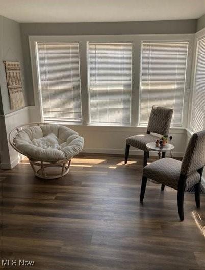 566 N Walnut St, Wooster, OH 44691 - sitting room with wood finished floors and baseboards