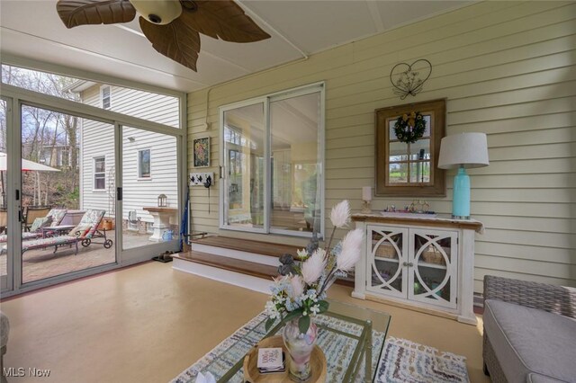6352 Creekside Trl, Solon, OH 44139 - sunroom / solarium with ceiling fan, plenty of natural light, and entry steps