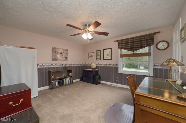 6352 Creekside Trl, Solon, OH 44139 - office area featuring a ceiling fan, a wainscoted wall, carpet flooring, a textured ceiling, and baseboards