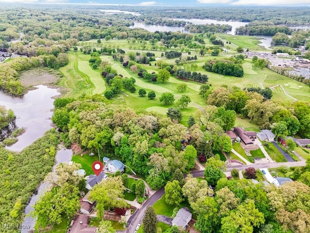 aerial view of a nearby body of water and a golf course