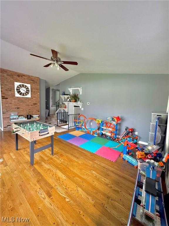 5460 Coronada Dr, Mentor-On-The-Lake, OH 44060 - game room with a ceiling fan, vaulted ceiling, and wood finished floors