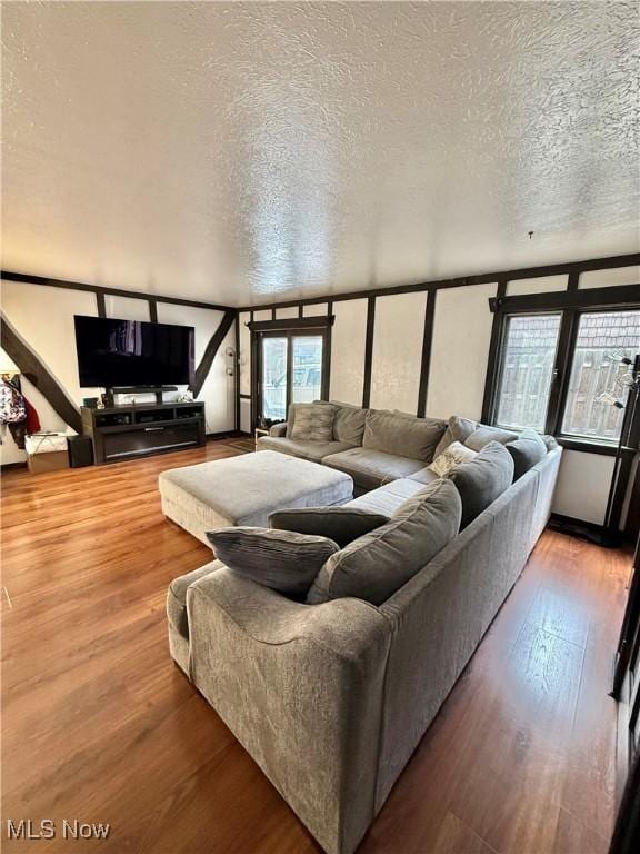 5460 Coronada Dr, Mentor-On-The-Lake, OH 44060 - living room with a textured ceiling and wood finished floors
