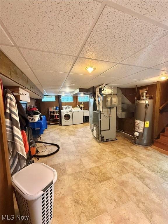 5460 Coronada Dr, Mentor-On-The-Lake, OH 44060 - basement featuring gas water heater, heating unit, a paneled ceiling, separate washer and dryer, and stairs