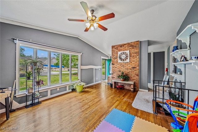 5460 Coronada Dr, Mentor-On-The-Lake, OH 44060 - playroom with lofted ceiling, ceiling fan, wood finished floors, and baseboards
