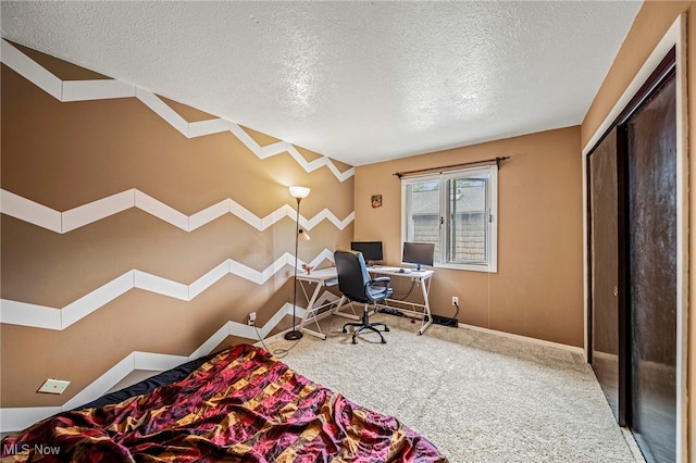5460 Coronada Dr, Mentor-On-The-Lake, OH 44060 - carpeted bedroom featuring a textured ceiling, baseboards, and a desk