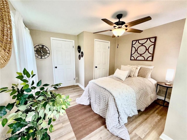 4812 Irma Ave, Youngstown, OH 44514 - bedroom featuring light wood-style flooring, baseboards, and a ceiling fan