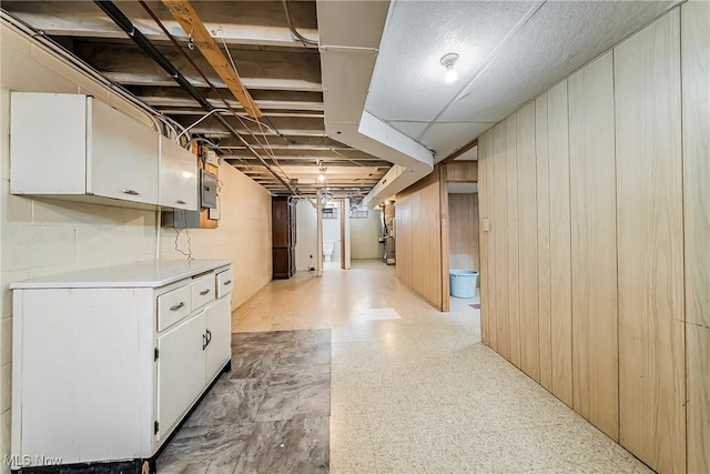 4713 Forest Edge Dr, Brooklyn, OH 44144 - finished basement featuring light flooring and wood walls