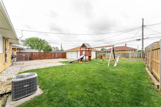 4713 Forest Edge Dr, Brooklyn, OH 44144 - view of yard with central AC, a playground, and a patio area