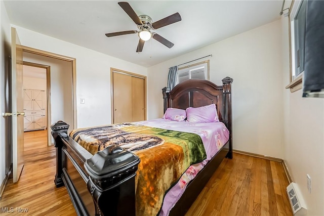4713 Forest Edge Dr, Brooklyn, OH 44144 - bedroom with light wood finished floors, a closet, a ceiling fan, and baseboards