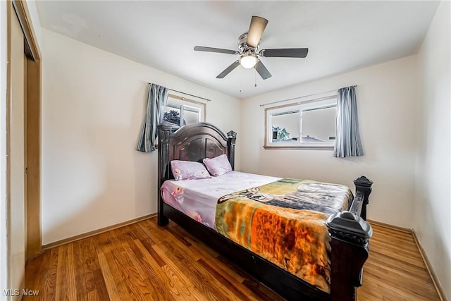 4713 Forest Edge Dr, Brooklyn, OH 44144 - bedroom featuring wood finished floors, baseboards, and a ceiling fan