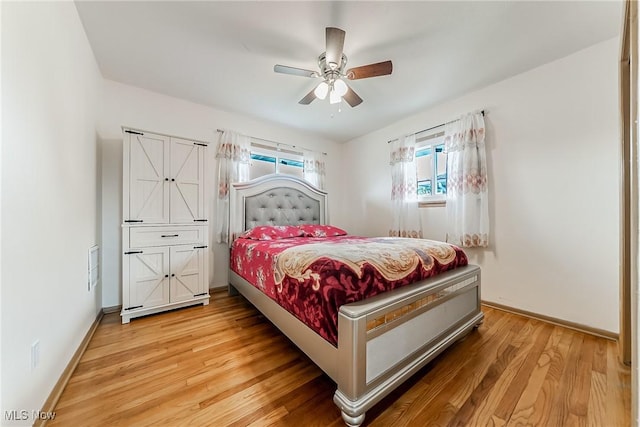 4713 Forest Edge Dr, Brooklyn, OH 44144 - bedroom featuring light wood finished floors, baseboards, and a ceiling fan