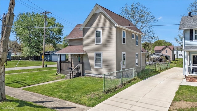 563 Mill St, Conneaut, OH 44030 - view of front of home featuring a shingled roof