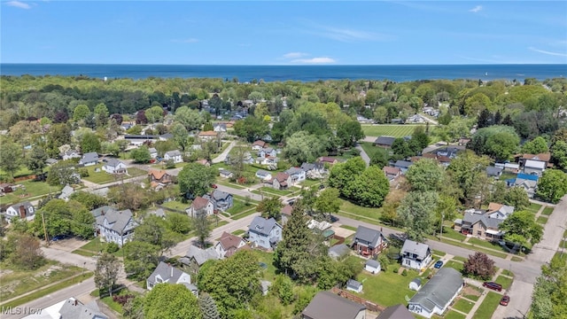 563 Mill St, Conneaut, OH 44030 - aerial overview of property's location with a large body of water and nearby suburban area
