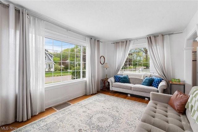 211 Harcourt Dr, Akron, OH 44313 - living area with healthy amount of natural light and light wood-type flooring