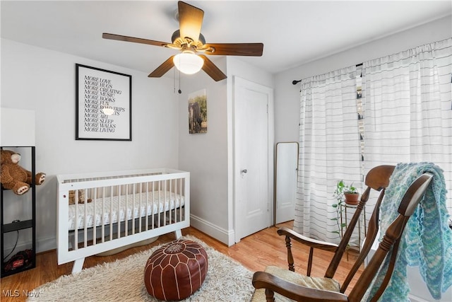 211 Harcourt Dr, Akron, OH 44313 - bedroom featuring wood finished floors, baseboards, and a ceiling fan