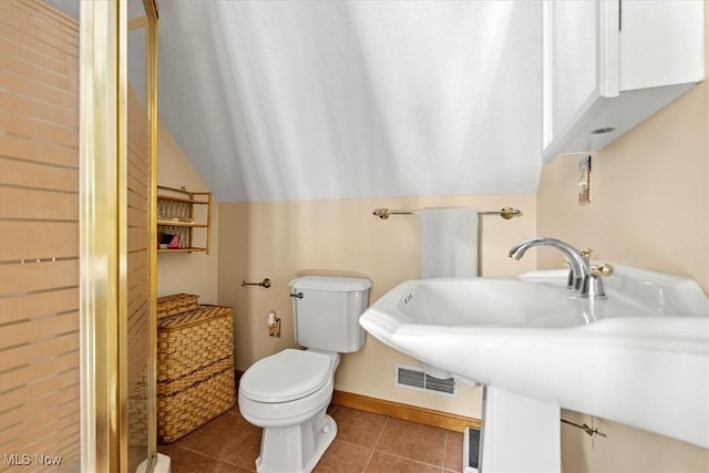2854 Wells Lock Rd, Elizabeth, WV 26143 - bathroom featuring toilet, tile patterned floors, baseboards, and a stall shower