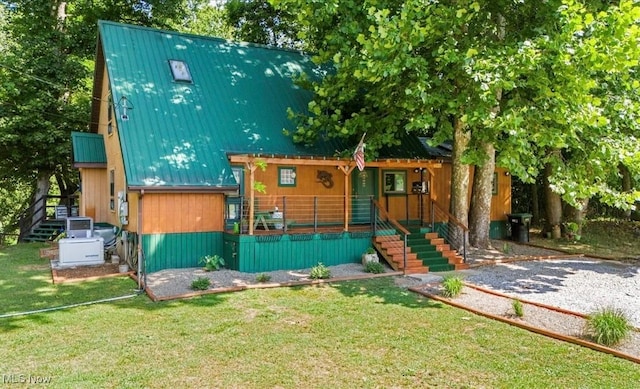 2854 Wells Lock Rd, Elizabeth, WV 26143 - view of front of property with stairway, metal roof, and a front yard