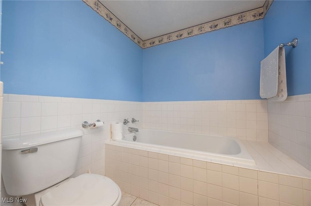 50504 State Route 556, Clarington, OH 43915 - full bath featuring toilet, a garden tub, and tile patterned floors