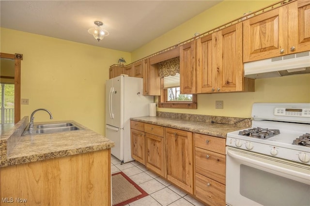 50504 State Route 556, Clarington, OH 43915 - kitchen with white appliances, under cabinet range hood, a sink, light tile patterned floors, and light countertops