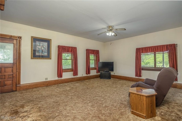 50504 State Route 556, Clarington, OH 43915 - living room featuring carpet flooring, ceiling fan, and plenty of natural light