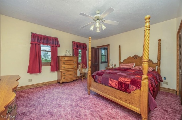 50504 State Route 556, Clarington, OH 43915 - bedroom featuring carpet, baseboards, a ceiling fan, and a textured ceiling