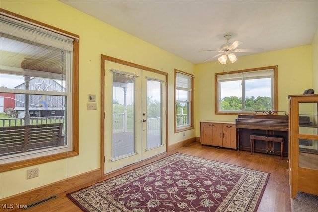 50504 State Route 556, Clarington, OH 43915 - doorway to outside featuring french doors, plenty of natural light, and a ceiling fan