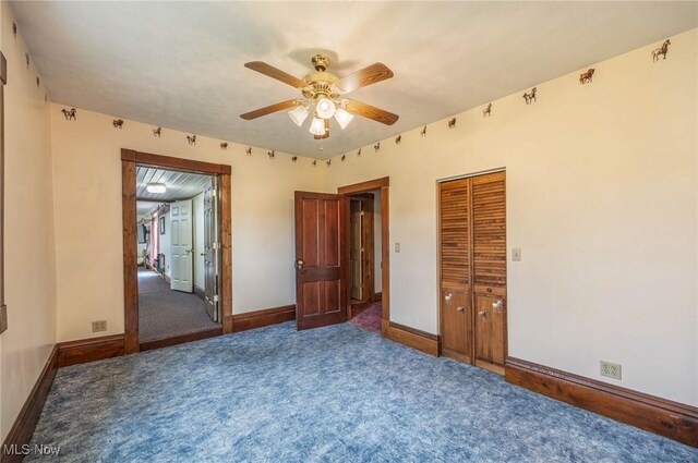 50504 State Route 556, Clarington, OH 43915 - carpeted empty room with a ceiling fan and baseboards
