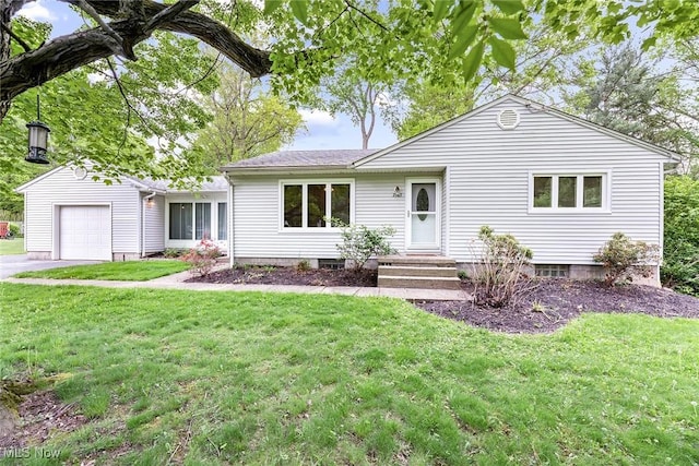 2583 Merria Rd, Stow, OH 44224 - ranch-style house featuring an attached garage, a front yard, and driveway