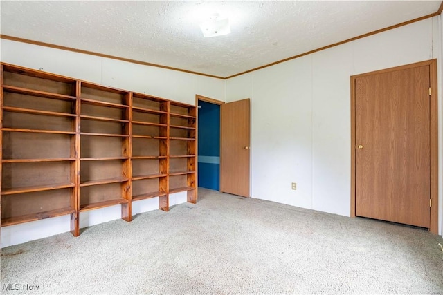 5240 Chalon Rd SW, Carrollton, OH 44615 - unfurnished bedroom featuring a textured ceiling, carpet flooring, and crown molding