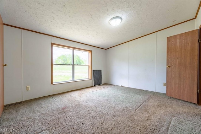 5240 Chalon Rd SW, Carrollton, OH 44615 - carpeted spare room with crown molding and a textured ceiling