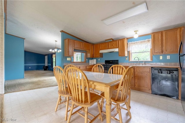 5240 Chalon Rd SW, Carrollton, OH 44615 - kitchen featuring black appliances, under cabinet range hood, lofted ceiling, light flooring, and a chandelier