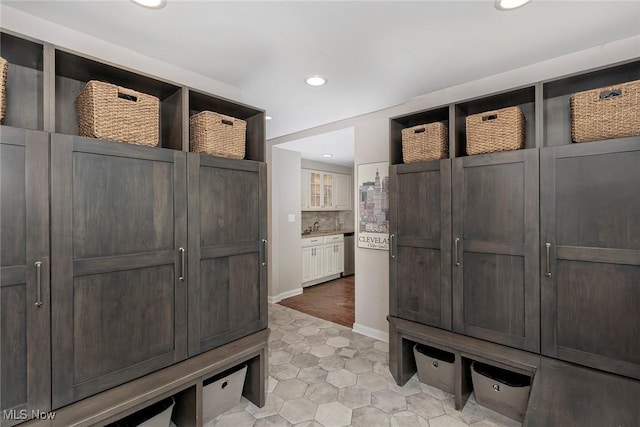 4168 Hadleigh Rd, University Heights, OH 44118 - mudroom with recessed lighting, light tile patterned flooring, and baseboards