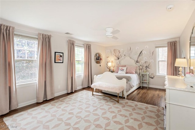 4168 Hadleigh Rd, University Heights, OH 44118 - bedroom featuring light wood finished floors, multiple windows, and baseboards