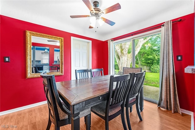 21494 Mastick Rd, Fairview Park, OH 44126 - dining room featuring baseboards, light wood finished floors, and ceiling fan