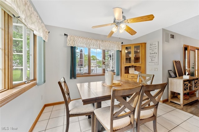 218 Tanglewood Dr, Dalton, OH 44618 - dining area featuring light tile patterned flooring, baseboards, and ceiling fan