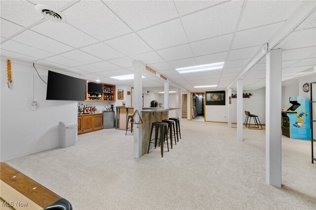 218 Tanglewood Dr, Dalton, OH 44618 - indoor wet bar featuring a drop ceiling and light colored carpet