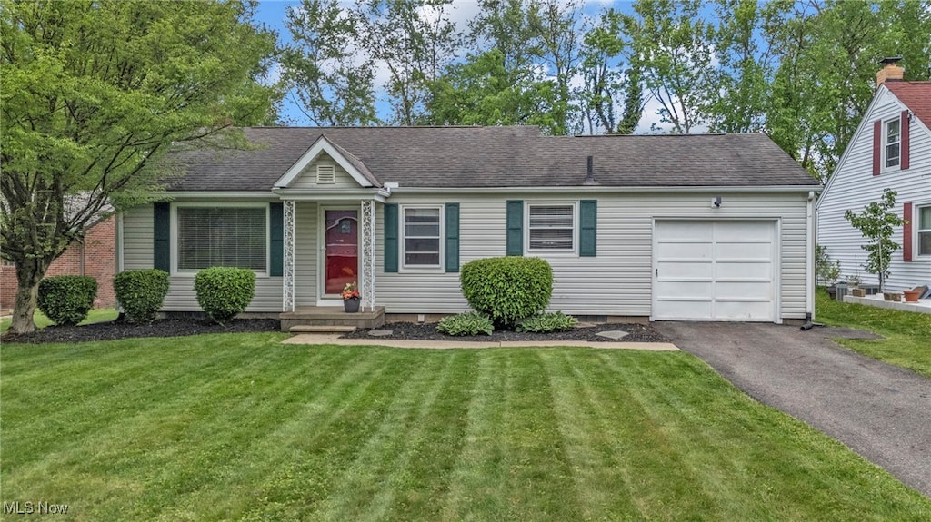 1804 50th St NW, Canton, OH 44709 - ranch-style home with a garage, a front yard, asphalt driveway, and roof with shingles