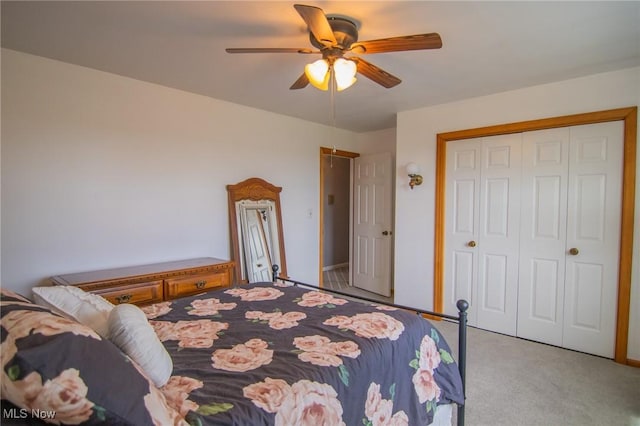 45 S Ridge Dr, Martins Ferry, OH 43935 - bedroom featuring light colored carpet, a closet, and ceiling fan