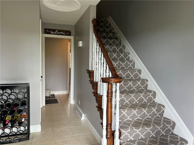 45 S Ridge Dr, Martins Ferry, OH 43935 - stairs with tile patterned flooring and baseboards