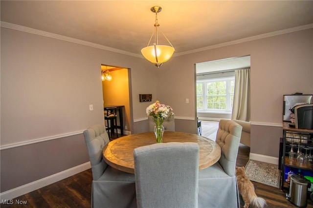 45 S Ridge Dr, Martins Ferry, OH 43935 - dining space featuring baseboards, wood finished floors, and crown molding
