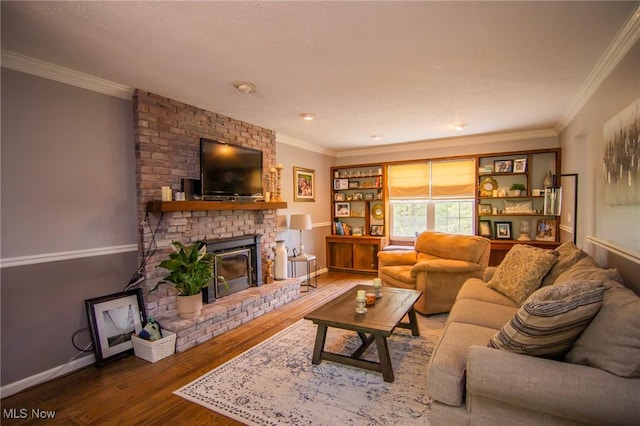 45 S Ridge Dr, Martins Ferry, OH 43935 - living area featuring wood finished floors, ornamental molding, baseboards, and a fireplace