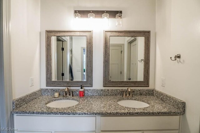 7841 State St NE, Louisville, OH 44641 - full bathroom with double vanity