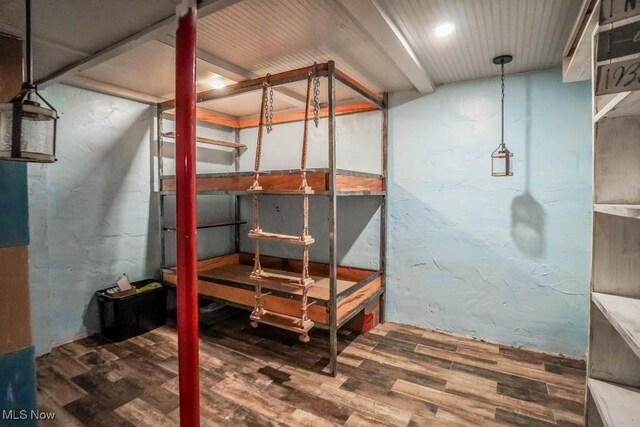 7841 State St NE, Louisville, OH 44641 - finished basement featuring wood finished floors