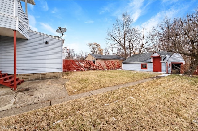3741 E 146th St, Cleveland, OH 44120 - view of grassy yard with an outbuilding
