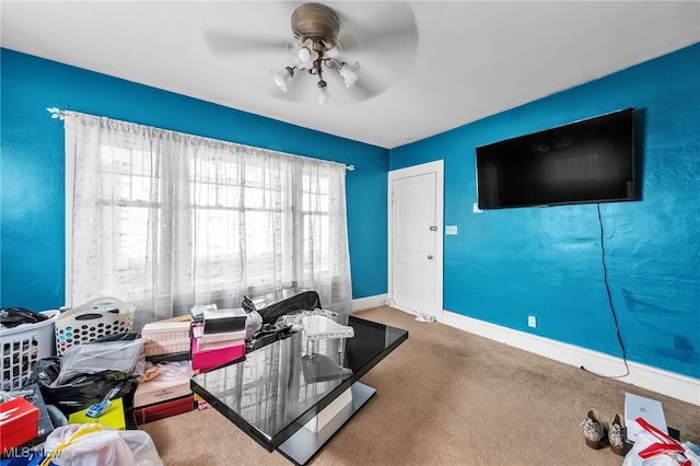3741 E 146th St, Cleveland, OH 44120 - carpeted living area featuring ceiling fan and baseboards