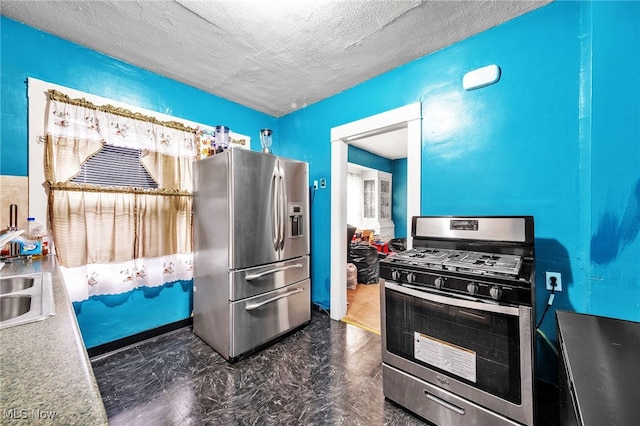 3741 E 146th St, Cleveland, OH 44120 - kitchen featuring stainless steel appliances, dark marble finish floors, a sink, and a textured ceiling
